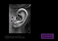 (33) surface tragus piercing